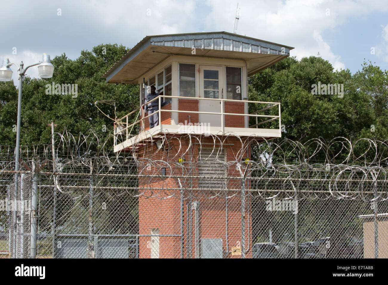 Prison guard at security lookout tower at Darrington Unit Prison near Houston, Texas Stock Photo