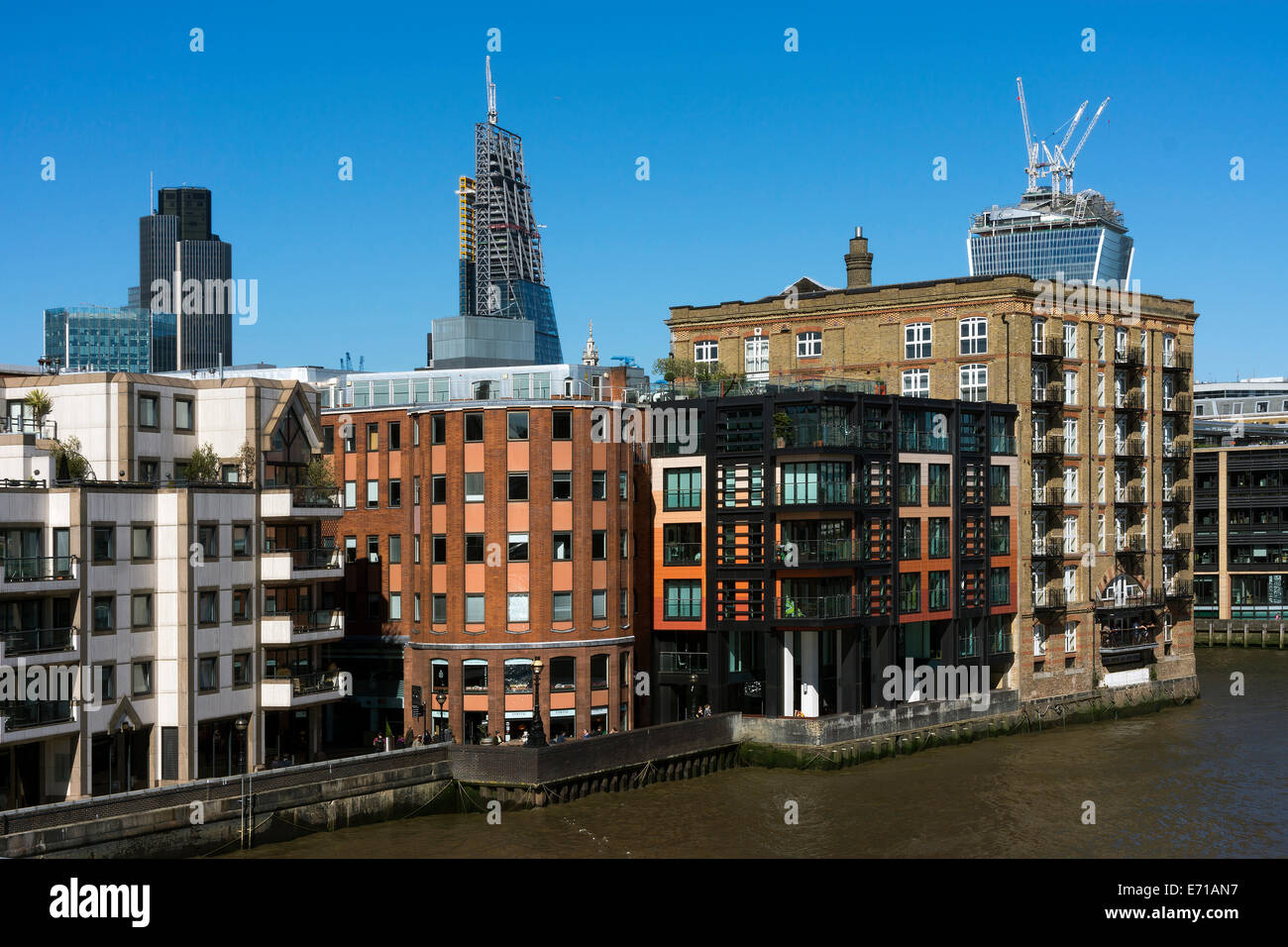 UK, London, City of London, view to multi-family houses with luxury apartments at Themse River Stock Photo