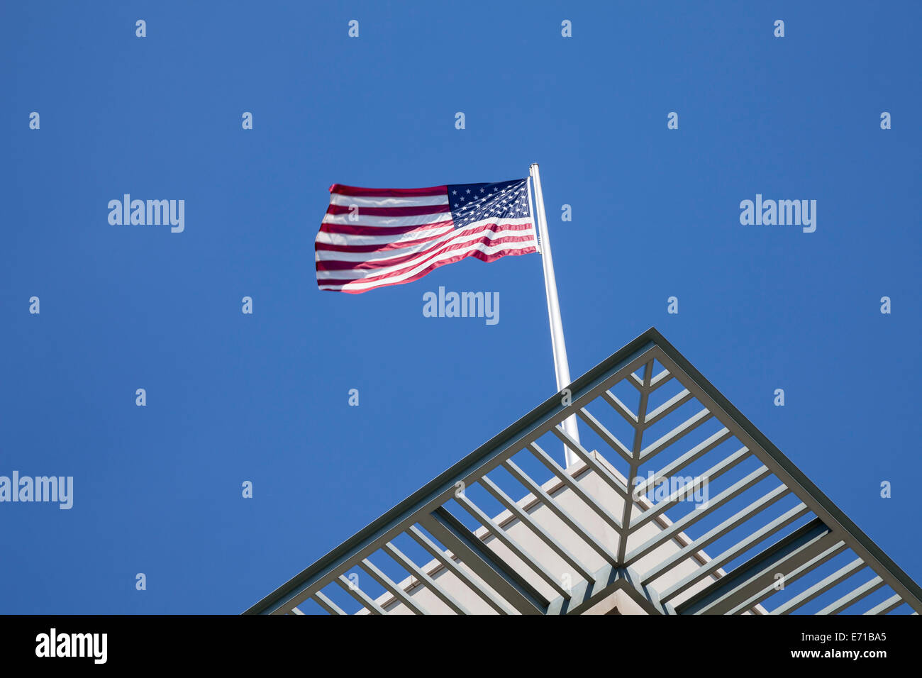 Germany, Berlin, US embassy with American flag Stock Photo