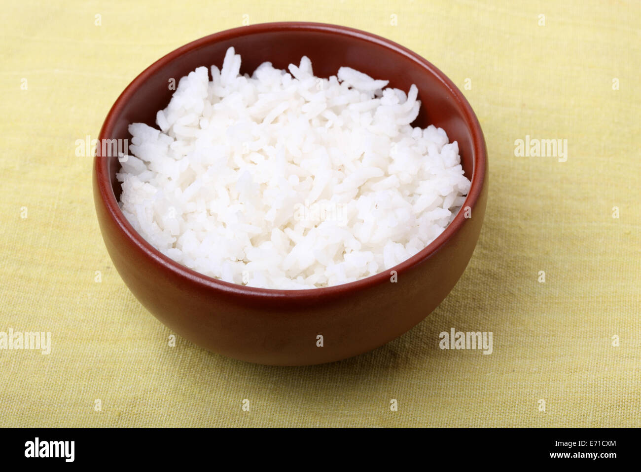 Cooked long grain rice in bowl. Closeup. Stock Photo