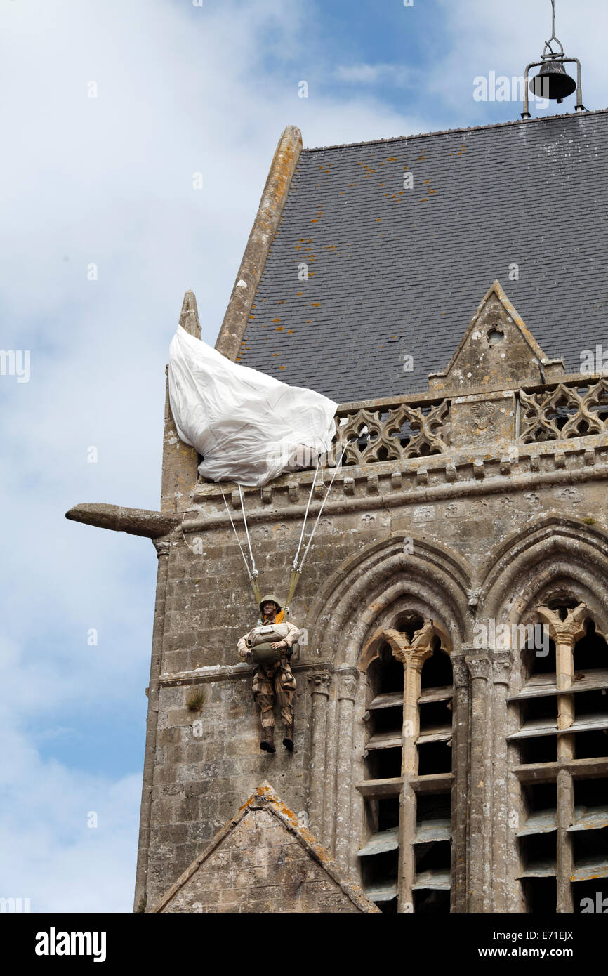 Memorial to John Steele on the spire of Sainte Mere Eglise church, Normandy, France. Stock Photo