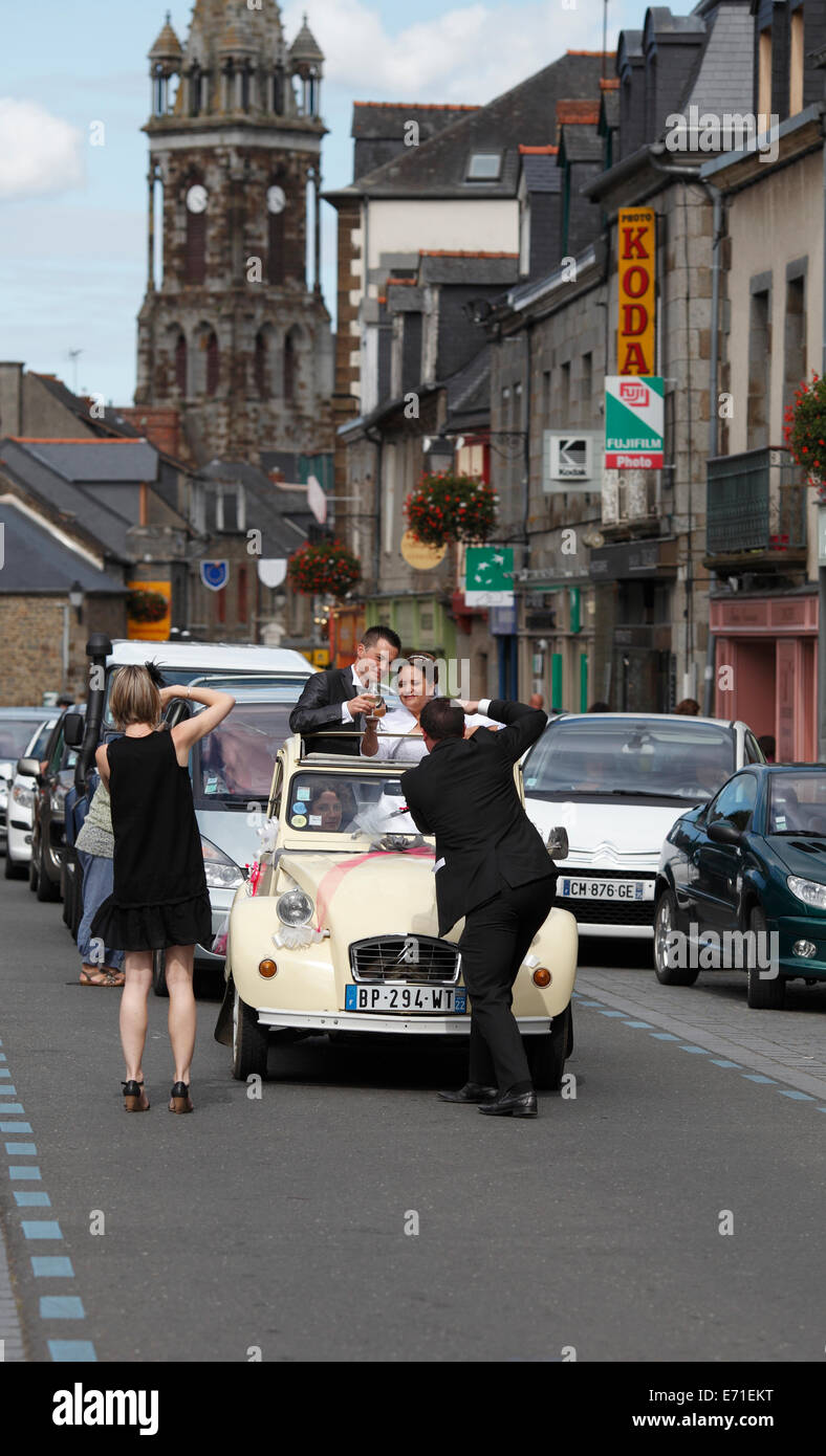 Wedding 2CV car in Combourg, Brittany France after the service. Stock Photo