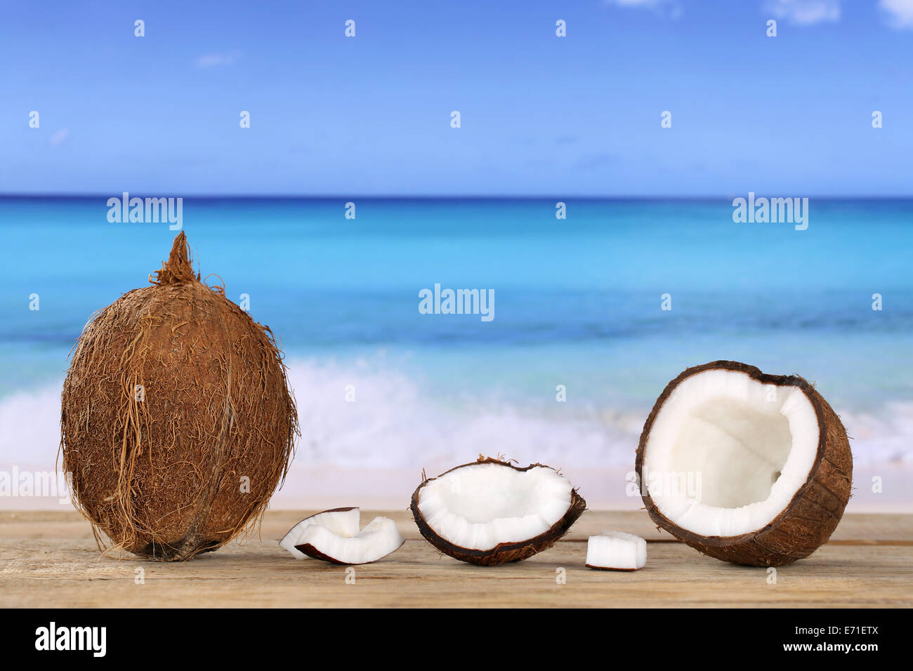 Coconut fruit in summer on the beach and sea Stock Photo