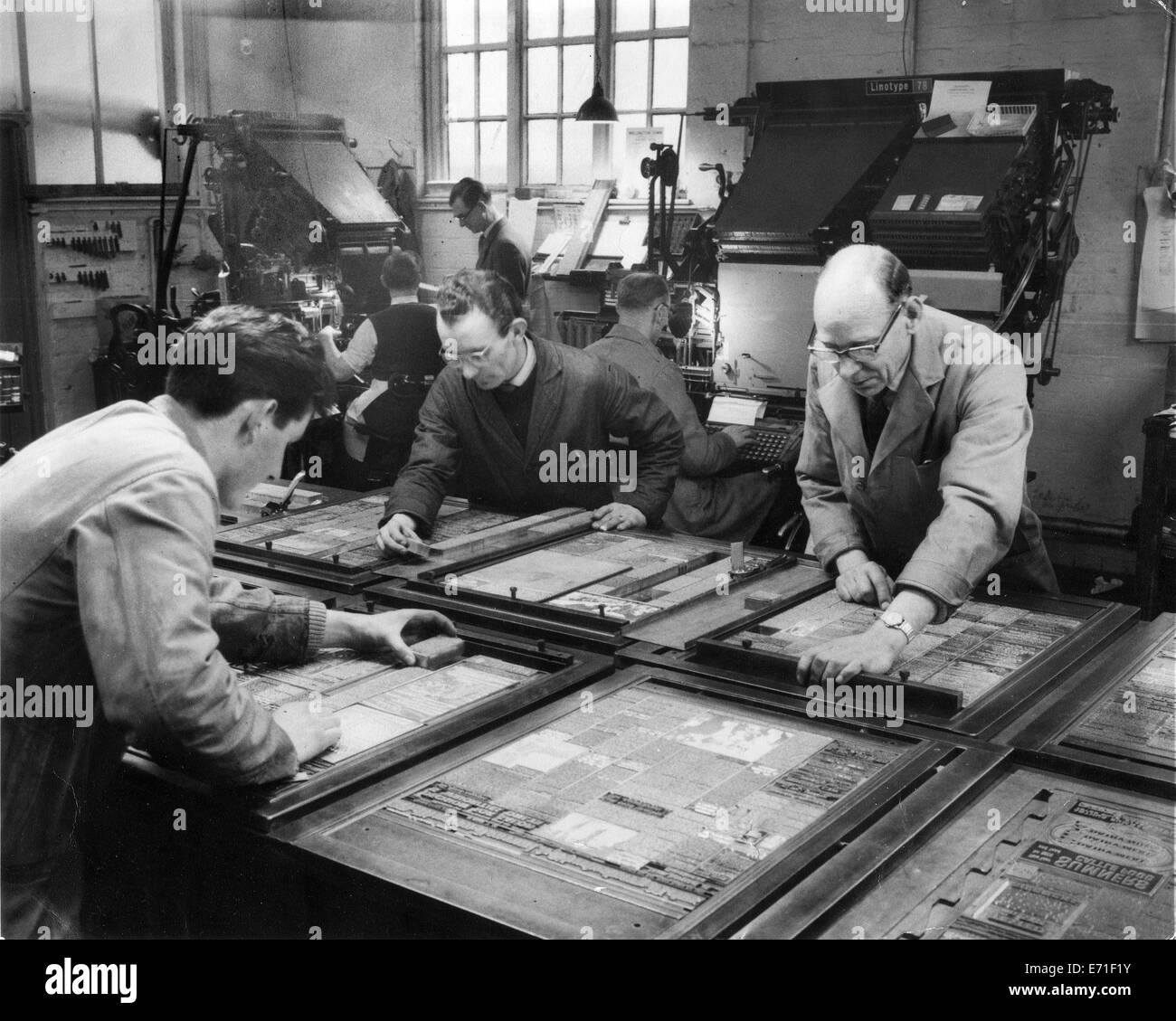 Newspaper printing stone hands working in the composing room of Wellington Journal & Shrewsbury News 1959 Stock Photo