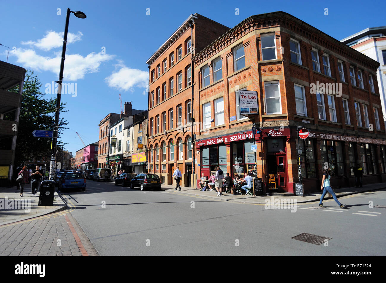 Junction of Thomas and Tib Streets in the Northern Quarter of Manchester - the Cultural Quarter. Stock Photo