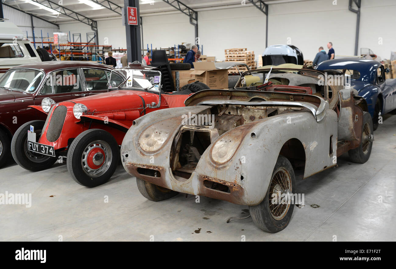 Old vintage cars Jaguar car waiting to be restored at Classic Motor Cars Uk Stock Photo