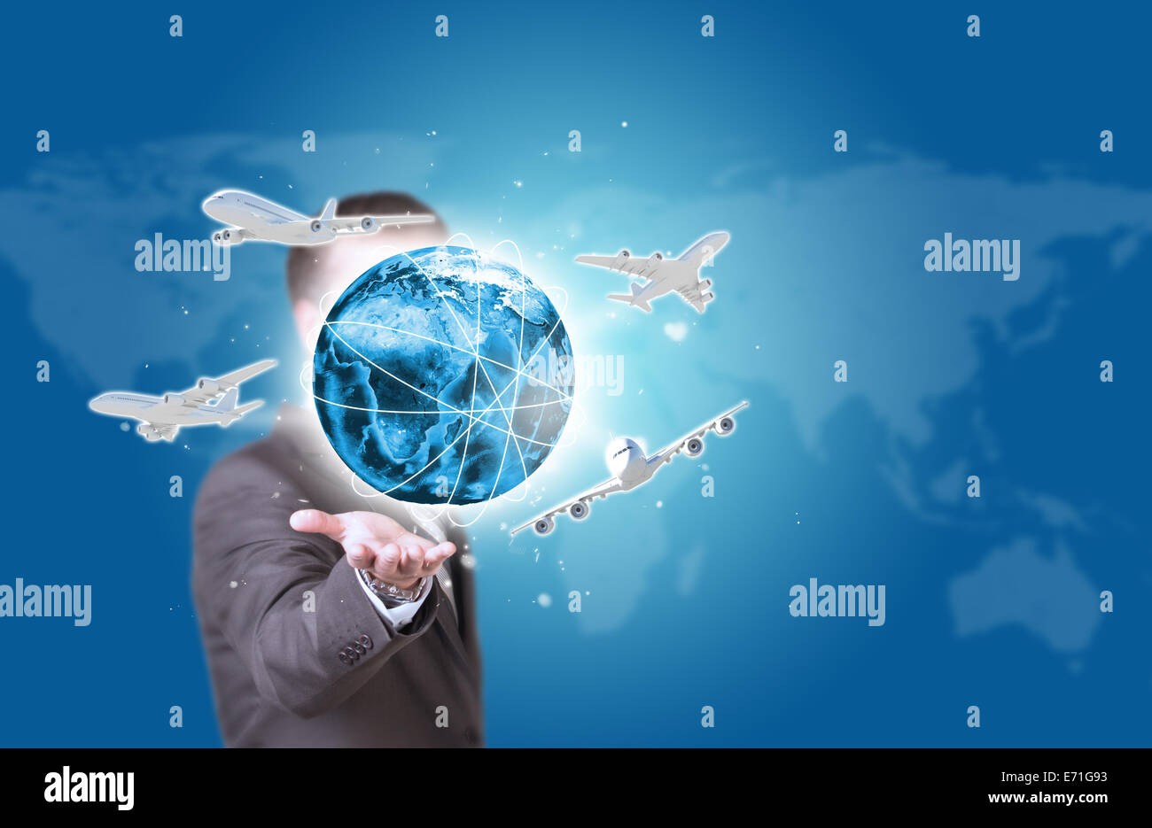 Business man hold Earth with airplanes in hand Stock Photo - Alamy