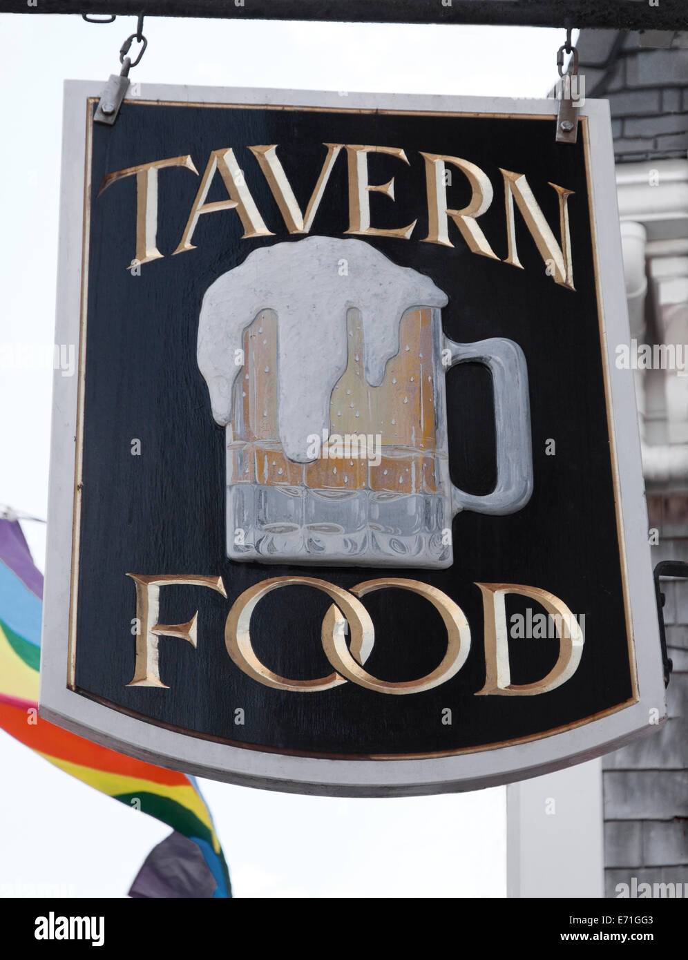 Tavern Food sign hanging outdoors. Stock Photo