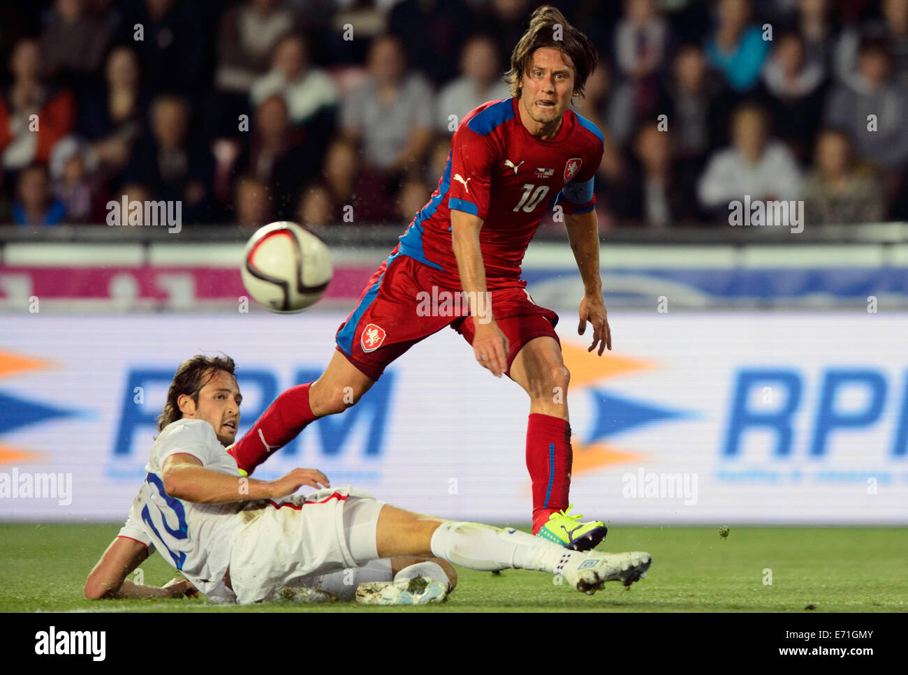 Prague, Czech Republic. 3rd Sep, 2014. Tomas Rosicky, right, of Czech Republic and Mix Diskerud of USA fight for a ball during the soccer friendly match Czech Republic vs USA in Prague, Czech Republic, September 3, 201 Credit: © Michal Kamaryt/CTK Photo/Alamy Live News  Stock Photo