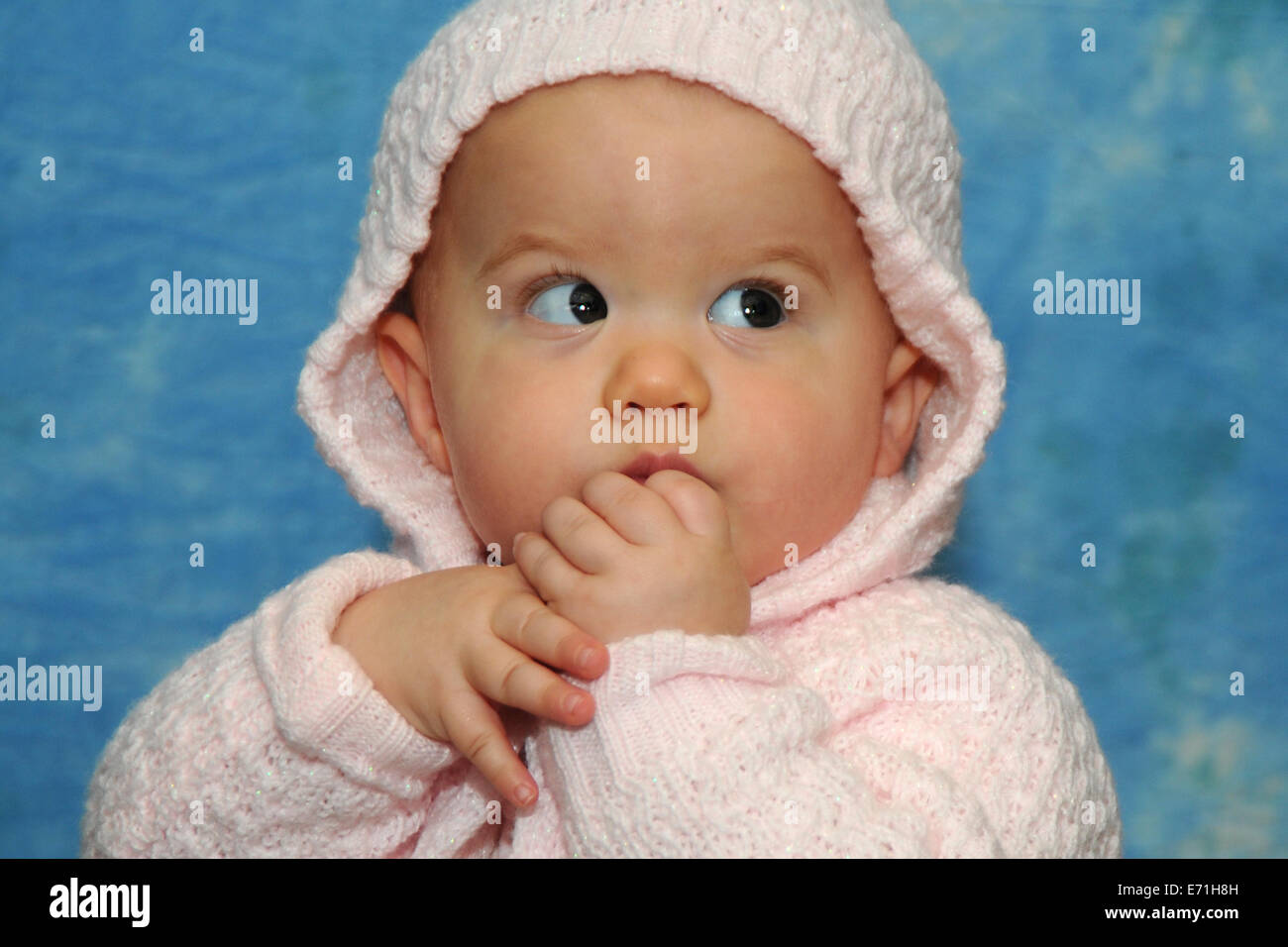 9 month old baby girl discovering her fingers Stock Photo Alamy