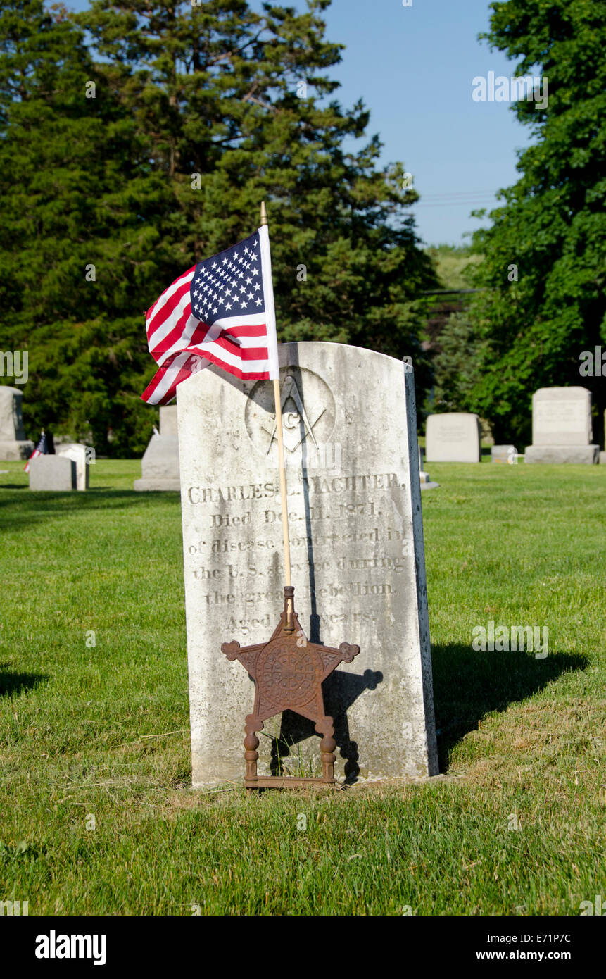 USA, New England, Rhode Island, Bristol. Historic military cemetery with US flags placed on graves. Stock Photo