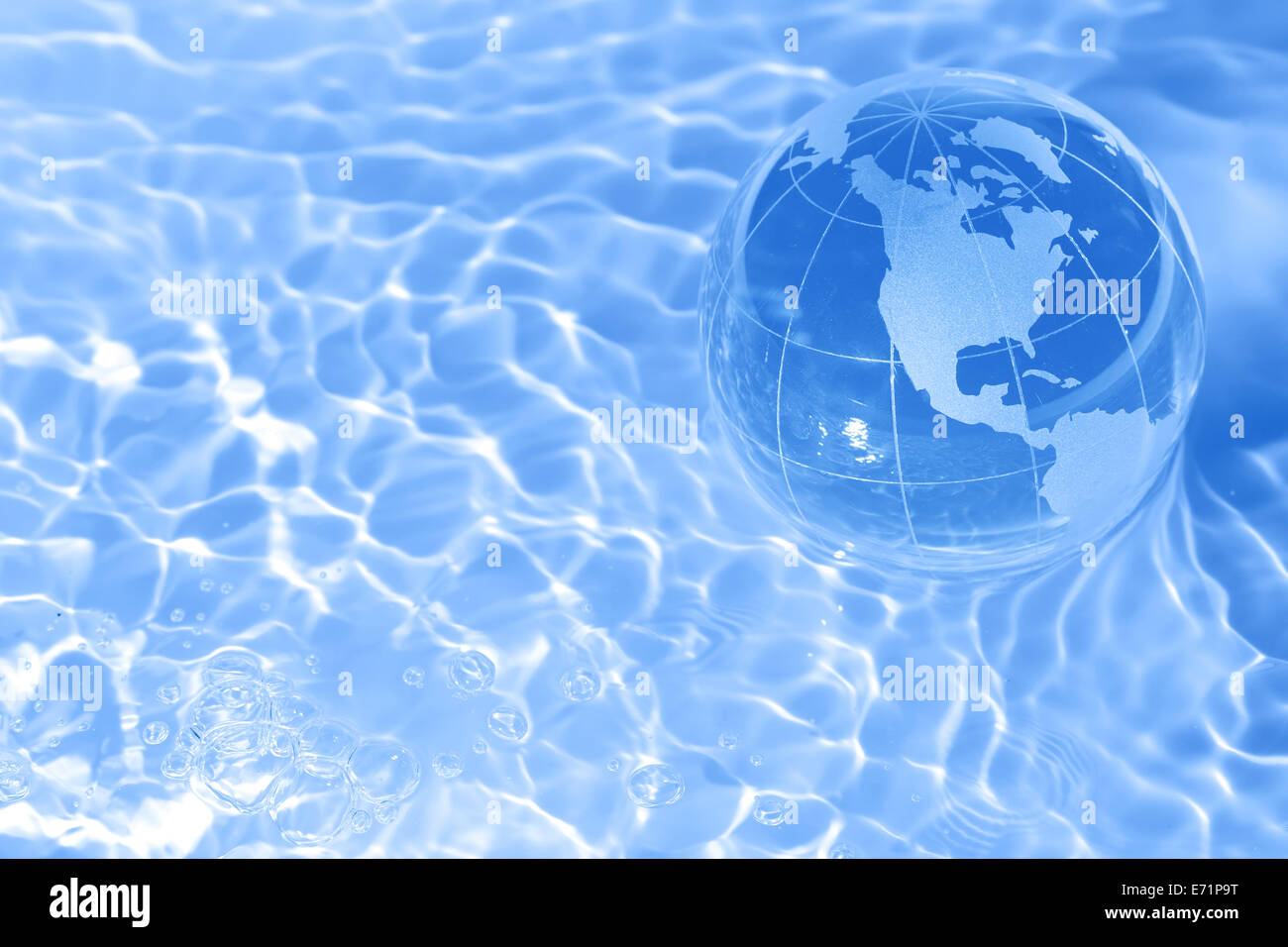 Earth in water Stock Photo