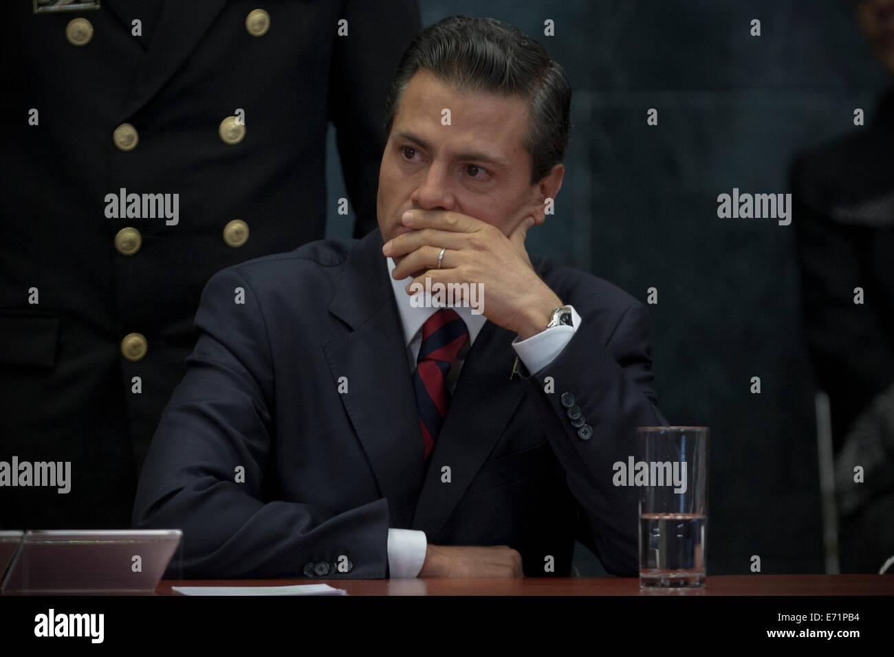 Mexico City, Mexico. 3rd Sep, 2014. The Mexican President, Enrique Pena Nieto, attends a ceremony to announce the winning design for the new international airport in Mexico City, Mexico, on Sept. 3, 2014. British architect Norman Foster and Mexico's Fernando Romero were announced here to be the winners for the design contract of Mexcio City's new airport. With a budget of 9.23 billion U.S. dollars, the new airport will have six landing strips and serve 126 million passengers a year, quadrupling the capacity of the current two-terminal international airport. Credit:  Xinhua/Alamy Live News Stock Photo