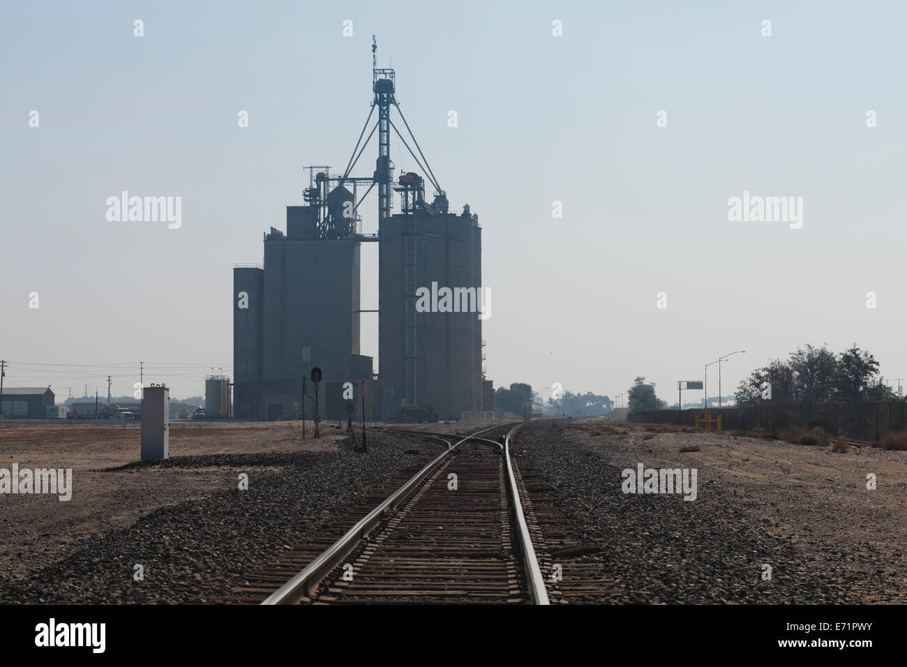 Industrial sized grain silos - San Joaquin Valley, California USA Stock Photo