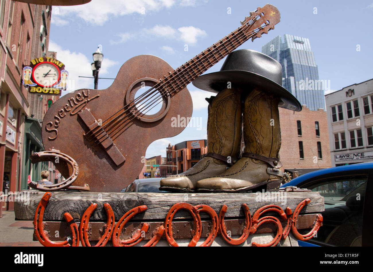 USA, Tennessee, Nashville. The Stage on Broadway sign and guitar