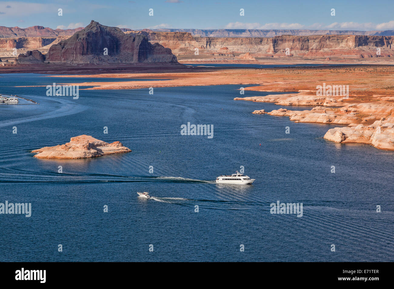 Lake Powell, Arizona, USA, with a couple of boats. The lake is a reservoir produced by damning the Colorado River. Stock Photo