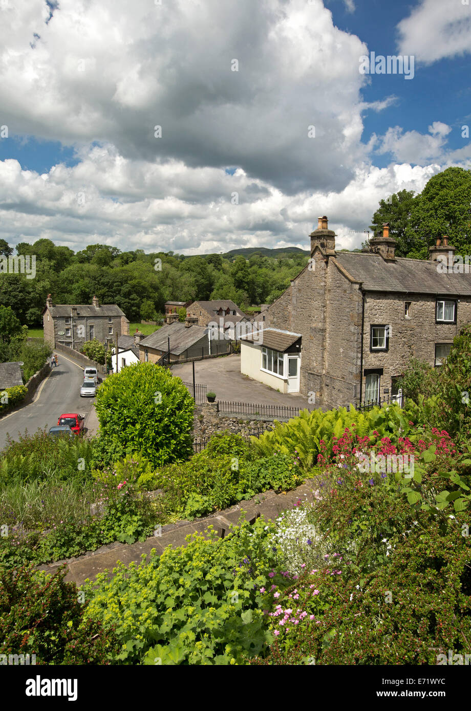 Lush gardens surrounding stone houses in old village of Ingleton in Yorkshire Dales region, England Stock Photo