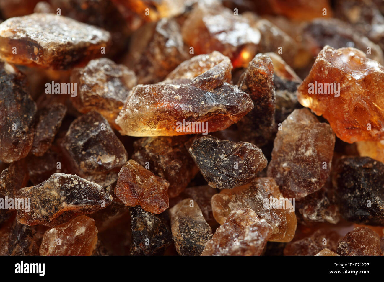 Rock cane sugar background. Closeup Stock Photo - Alamy