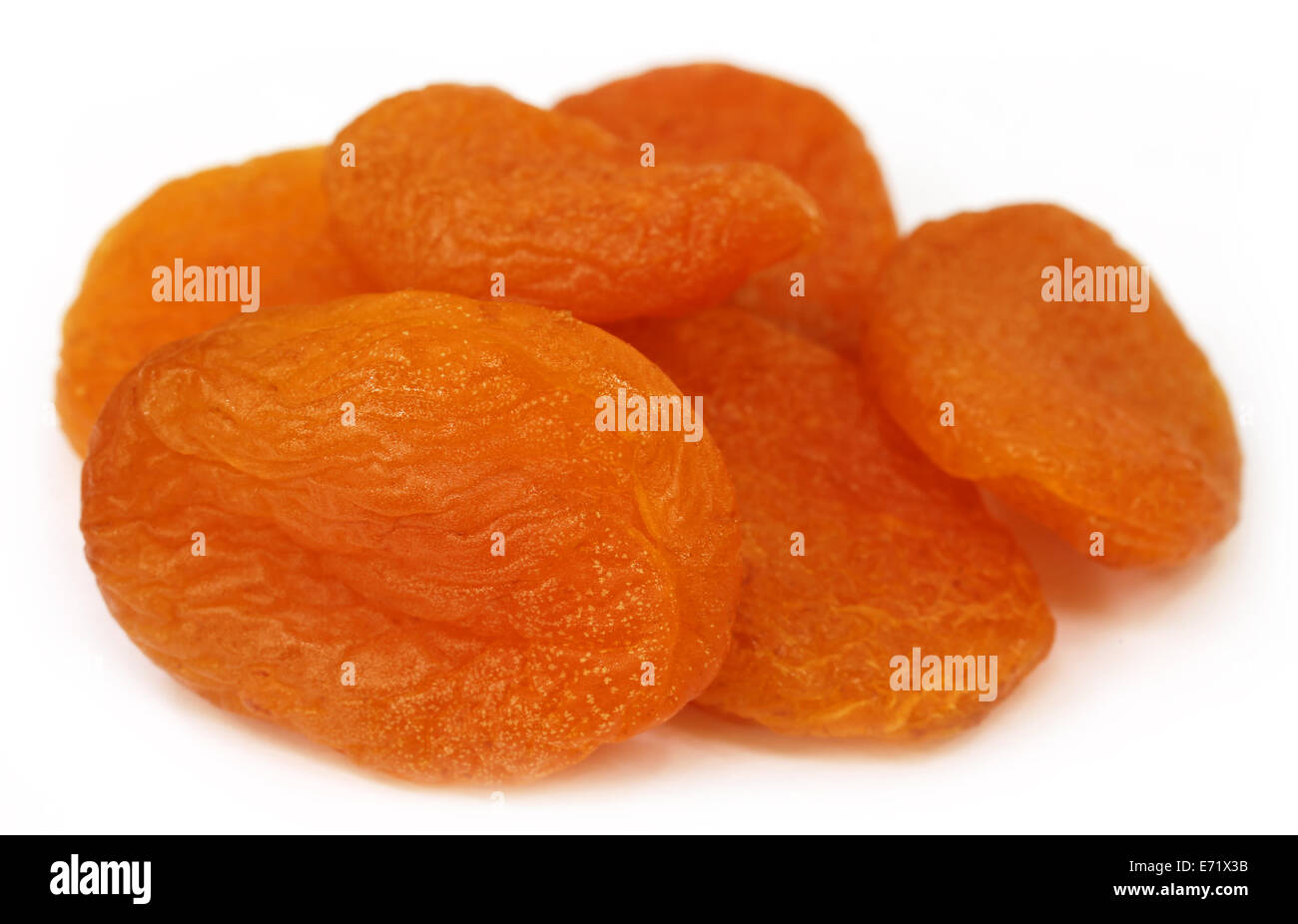 Dried apricots over white background Stock Photo Alamy