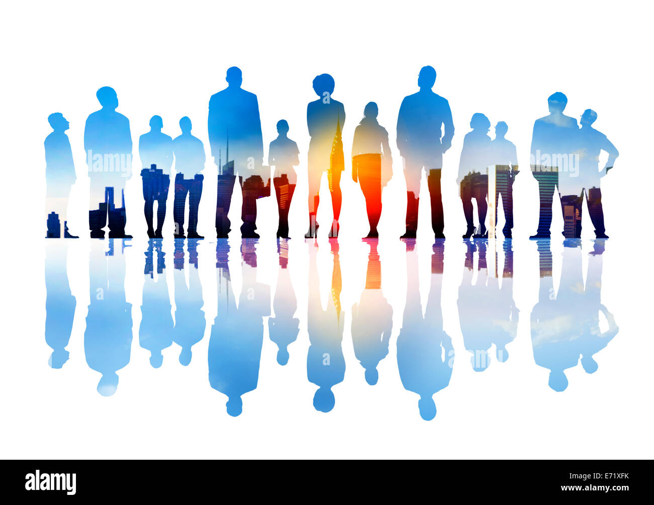 Silhouettes of Business People Looking Up in a City Scape Stock Photo