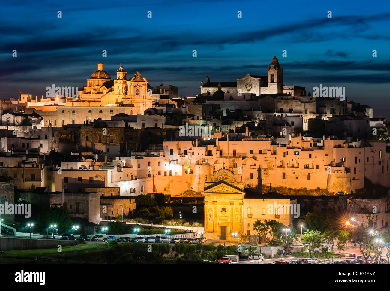 View of the town with the cathedral, right, and the church Chiesa delle Monacelle, left, Ostuni, Apulia, Italy Stock Photo