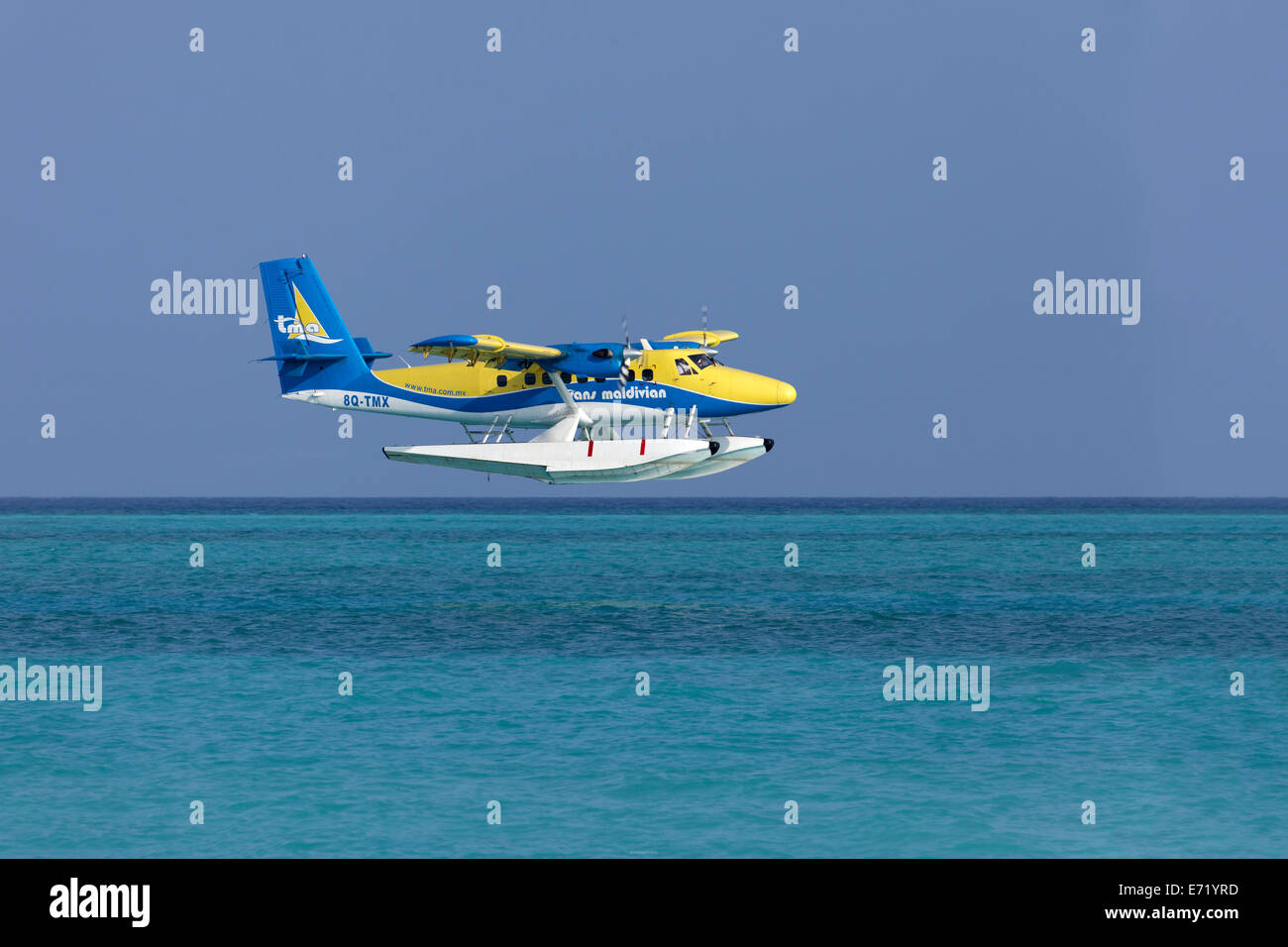 Hydroplane of Trans Maldivian Airways, De Havilland Canada DHC 6-400 Twin Otter, during the landing approach, Maldives Stock Photo