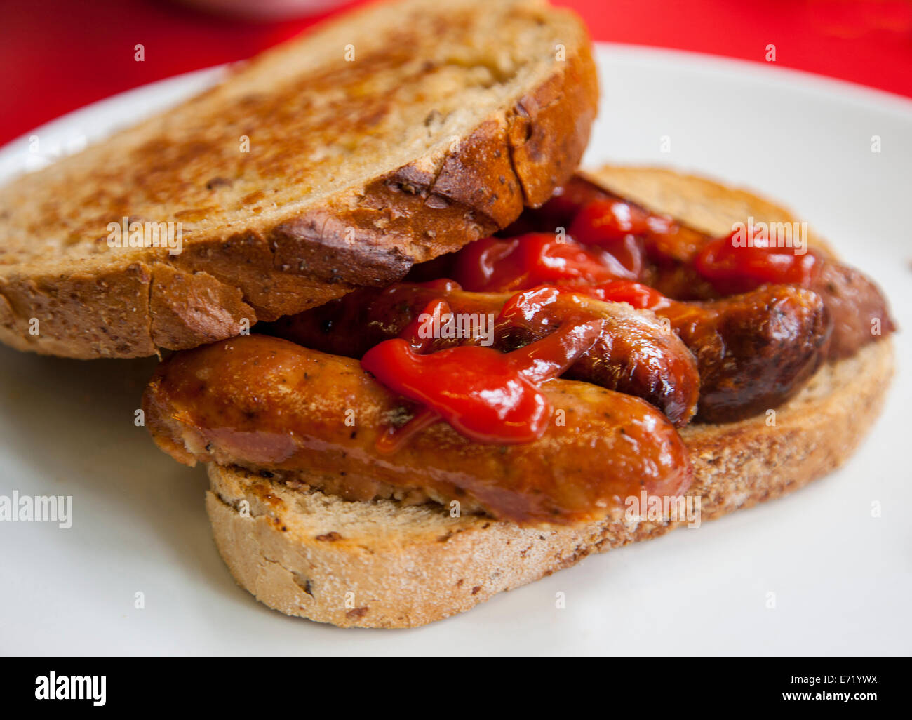 Toasted sausage sandwich with ketchup Stock Photo Alamy