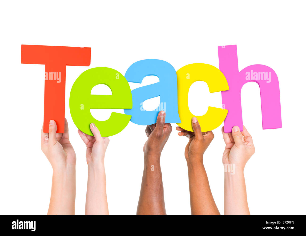 Multi-Ethnic Group Of People Holding The Word Teach Stock Photo - Alamy