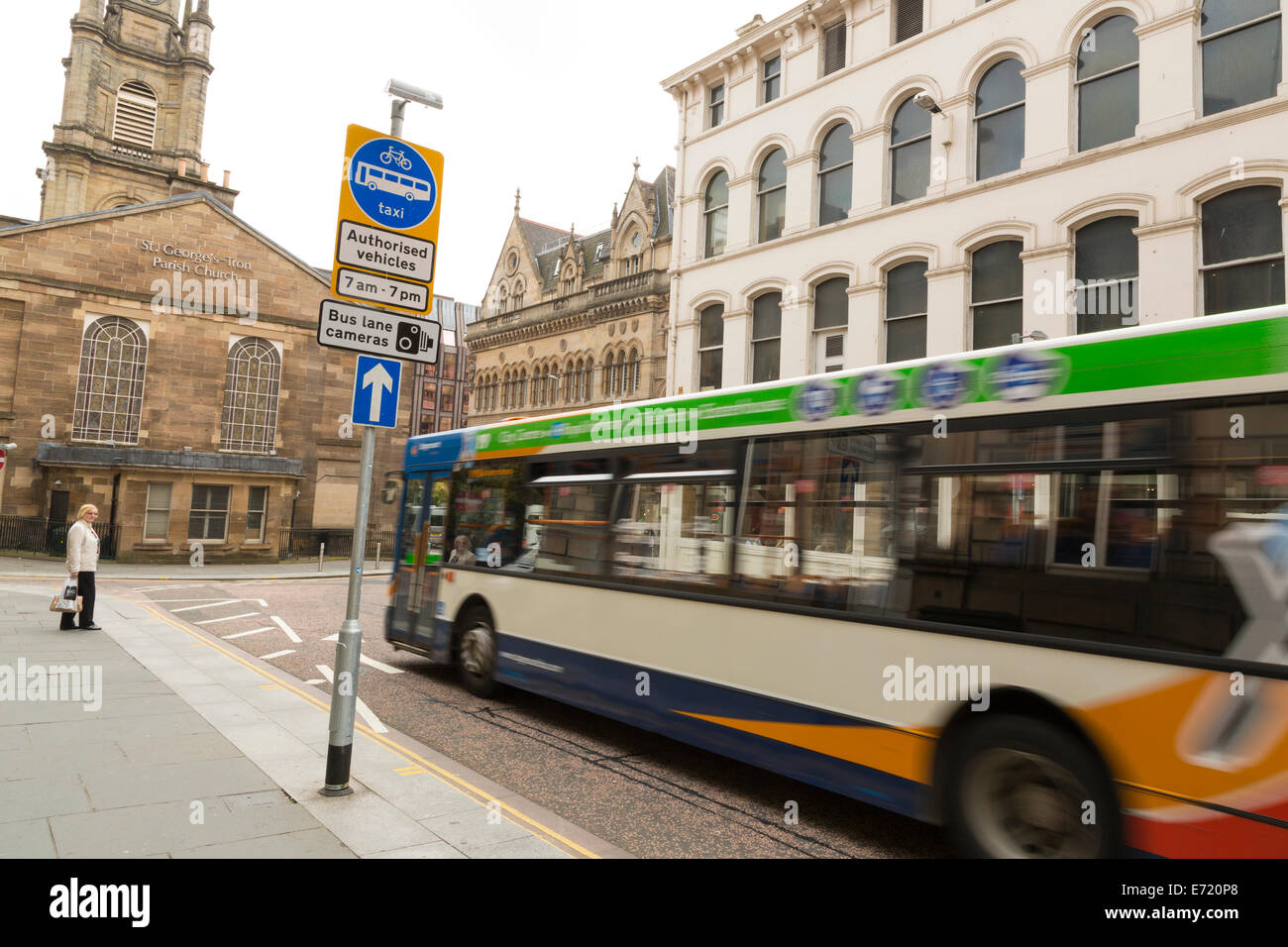 Bus going through a bus & taxi camera lane, Nelson Mandela Place, Glasgow, Scotland. Stock Photo