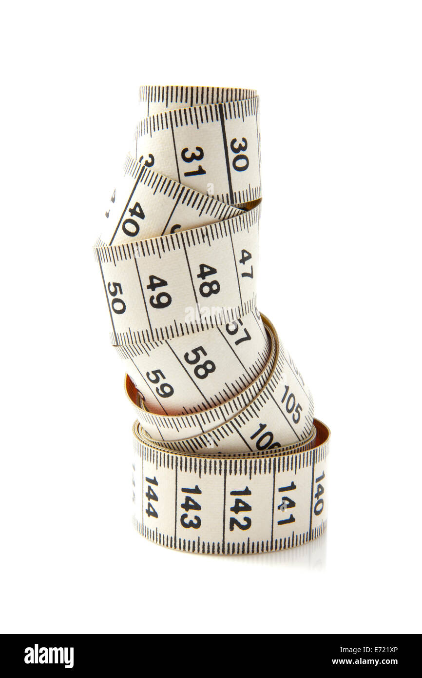 White measure tape rolled up over white Stock Photo