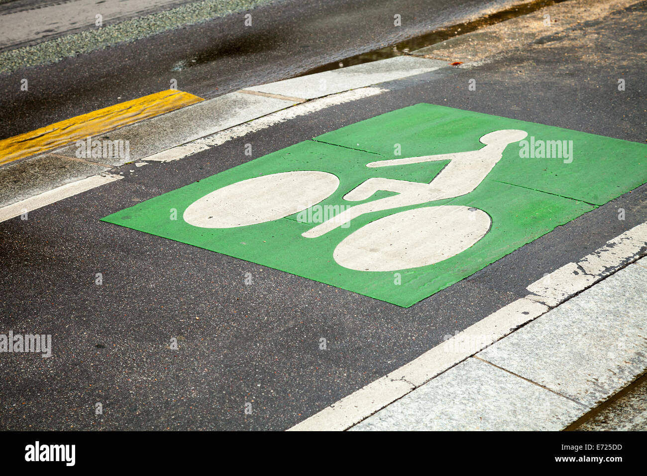 Bicycle lane. Green road marking on asphalt road Stock Photo