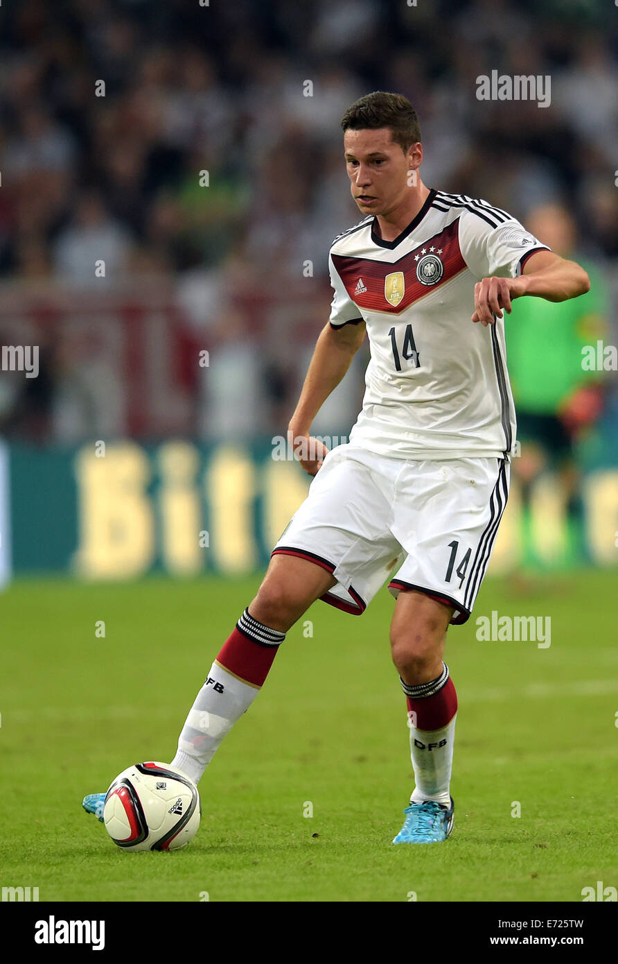 Duesseldorf, Germany. 03rd Sep, 2014. Germany's Julian Draxler vies for the ball during the international soccer match between Germany and Argentina at Esprit arena in Duesseldorf, Germany, 03 September 2014. Photo: Federico Gambarini/dpa/Alamy Live News Stock Photo