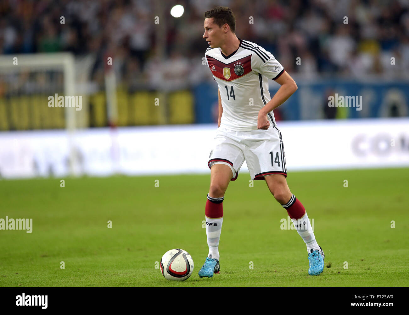 Duesseldorf, Germany. 03rd Sep, 2014. Germany's Julian Draxler vies for the ball during the international soccer match between Germany and Argentina at Esprit arena in Duesseldorf, Germany, 03 September 2014. Photo: Federico Gambarini/dpa/Alamy Live News Stock Photo