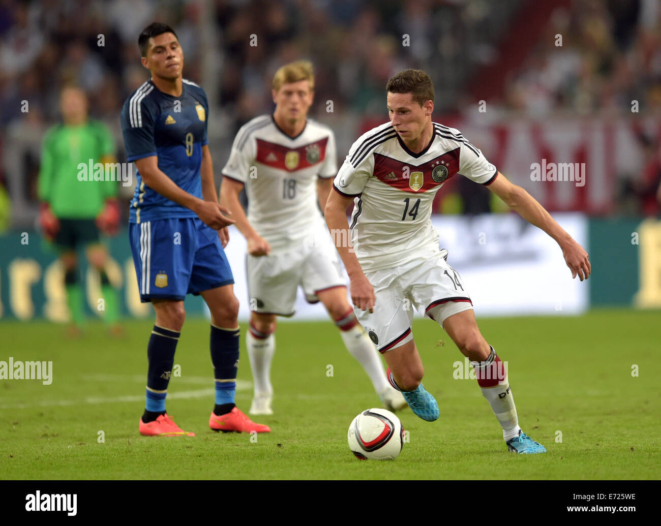 Duesseldorf, Germany. 03rd Sep, 2014. Germany's Julian Draxler (R) and Argentina's Enzo Perez (L) vie for the ball during the international soccer match between Germany and Argentina at Esprit arena in Duesseldorf, Germany, 03 September 2014. Photo: Federico Gambarini/dpa/Alamy Live News Stock Photo