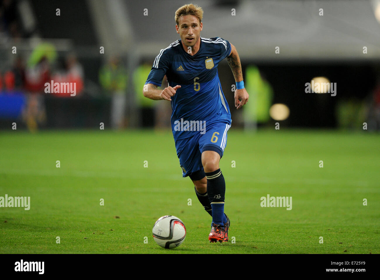 Esprit Arena, Duesseldorf, Germany. 3rd Sep, 2014. Argentina's Lucas Biglia plays the ball during the soccer friendly between Germany and Argentina at Esprit Arena, Duesseldorf, Germany, 3 September 2014. Photo: Jonas Guettler/dpa/Alamy Live News Stock Photo
