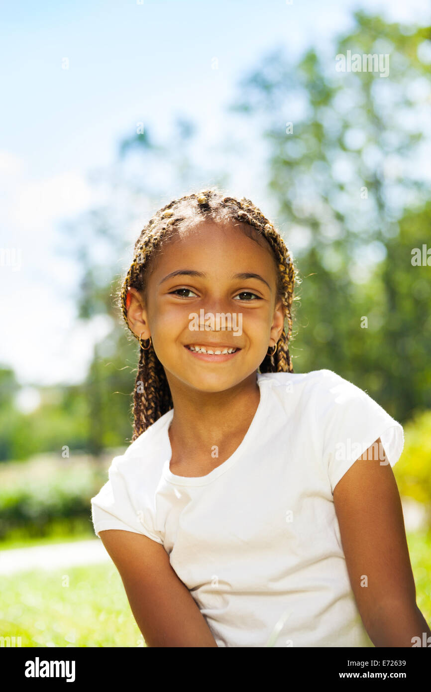 Close portrait of black girl in the park Stock Photo - Alamy