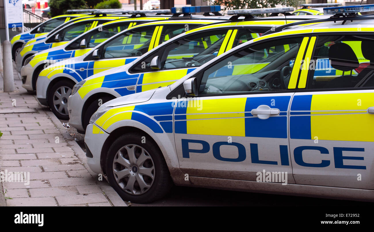 Row of parked marked police cars outside Gloucester Police Station, Bearland, Gloucester, Gloucestershire, England, UK. Stock Photo