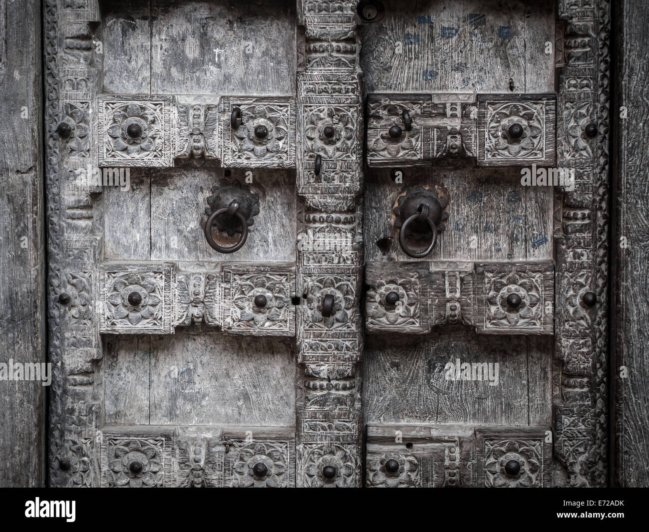 Old wooden carved door in Stone Town on Zanzibar island. Stock Photo