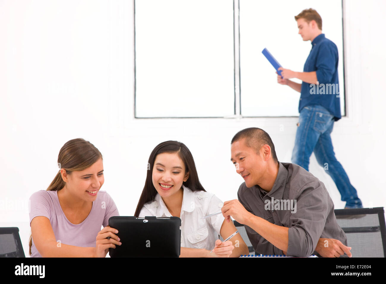 Group of diverse business people in office Stock Photo - Alamy