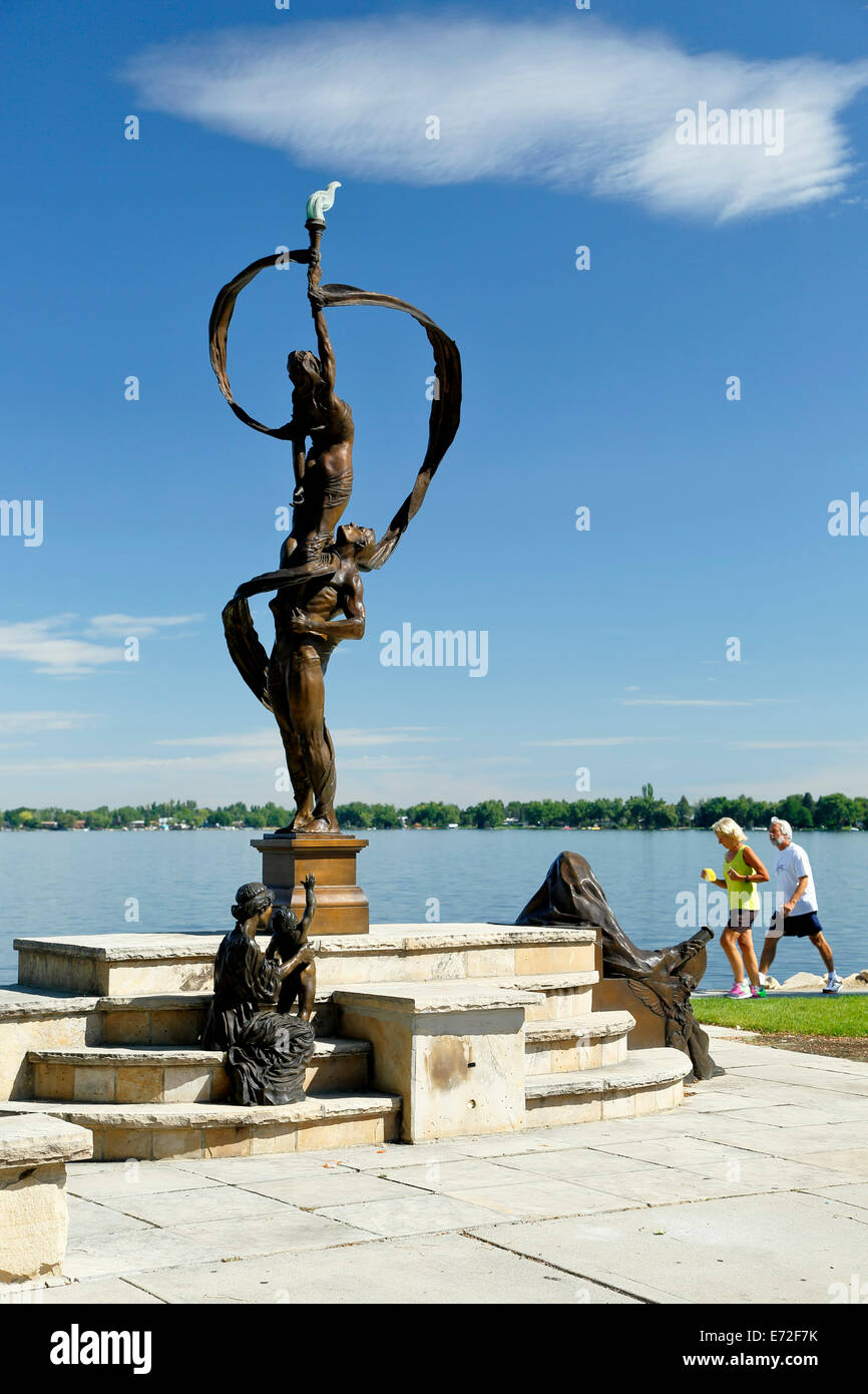 "Generations" sculpture, joggers and Lake Loveland, Loveland, Colorado