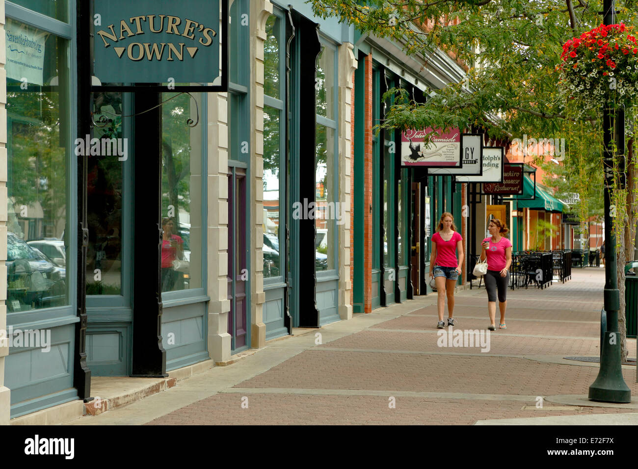 Women walking by shops and stores, Old Town, Fort Collins, Colorado USA Stock Photo