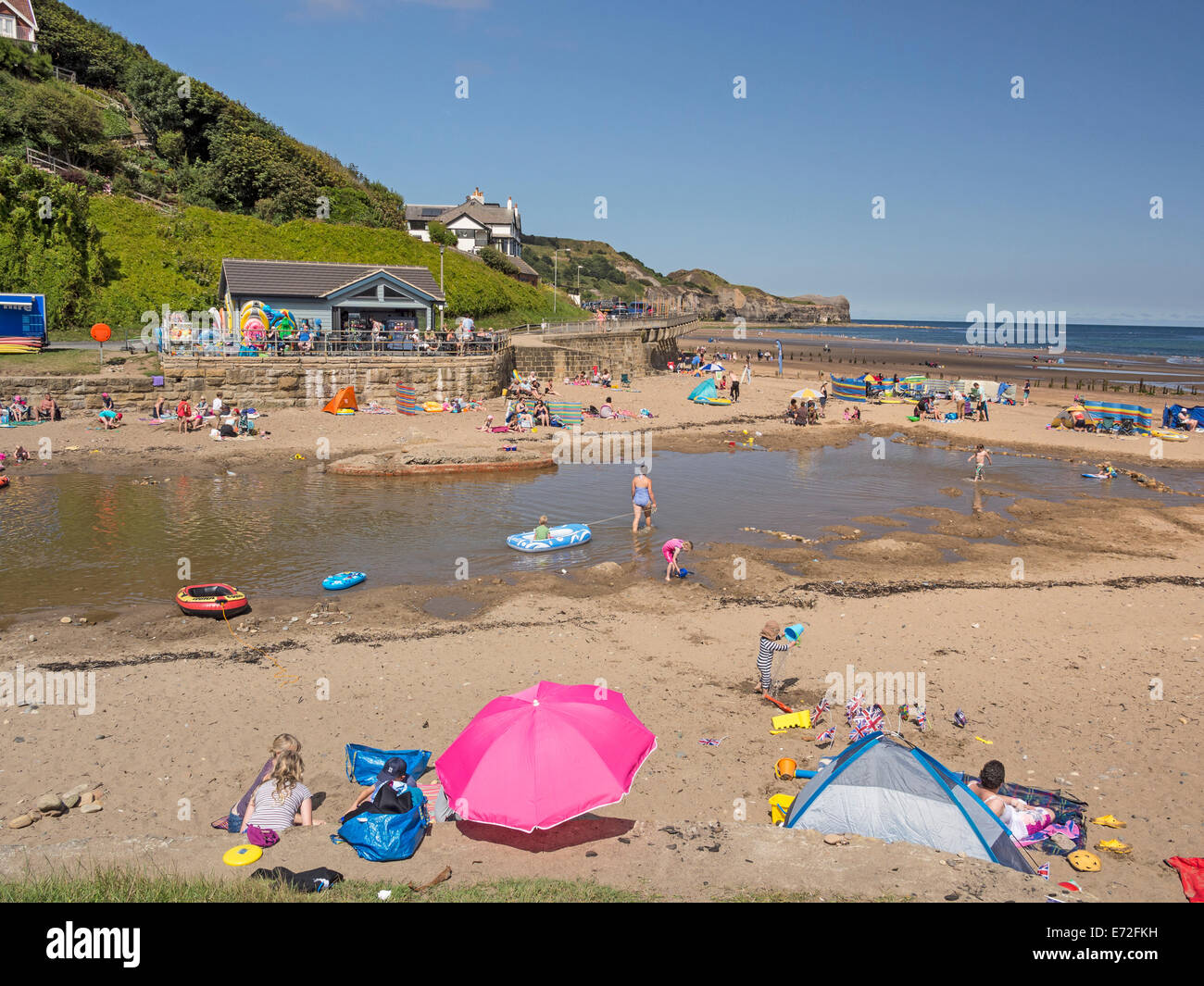 Sandsend Yorkshire UK Beach and Lagoon in August Stock Photo