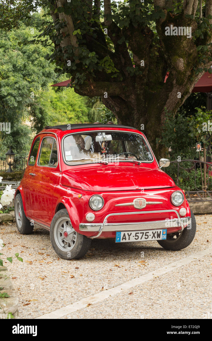 Classic Fiat 500, the Cinquecento in red. Stock Photo