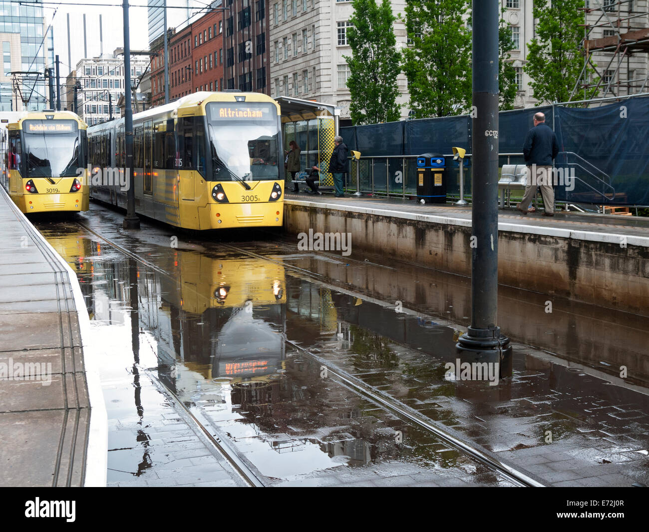 Manchester Metrolink tram on a wet day in St. Peter's Square, Manchester, England, UK Stock Photo