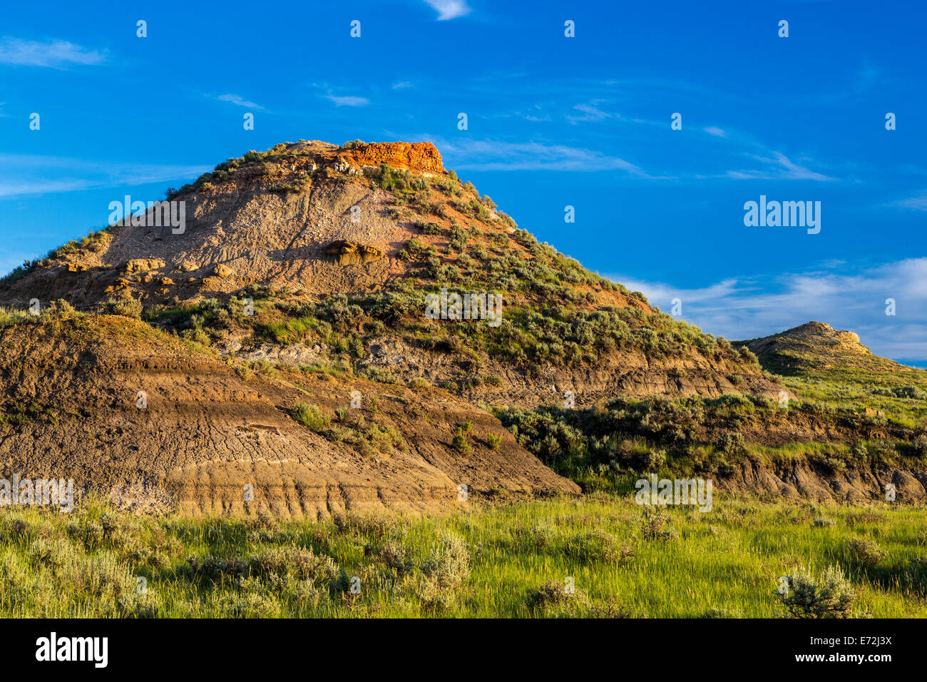 Badland formations in short grass prairie in Garfield County, Montana ...