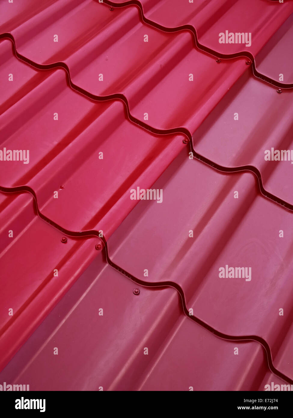 Colored tin roof structure that mimics the tiles Stock Photo Alamy