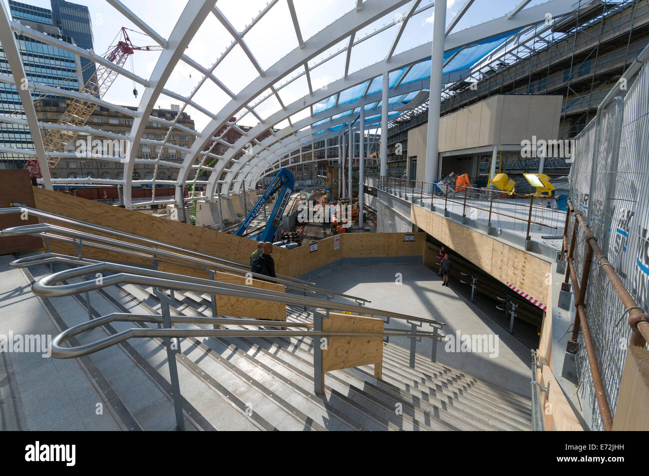 New roof being constructed and steps to new mezzanine level at Victoria Station, Manchester, England, UK Stock Photo