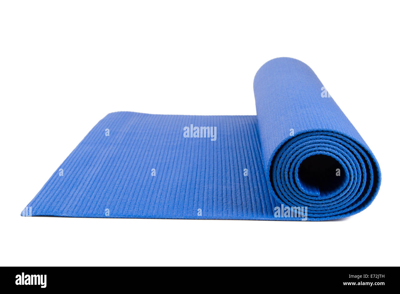 Close up view of blue open yoga mat for exercise, isolated on white background. Stock Photo