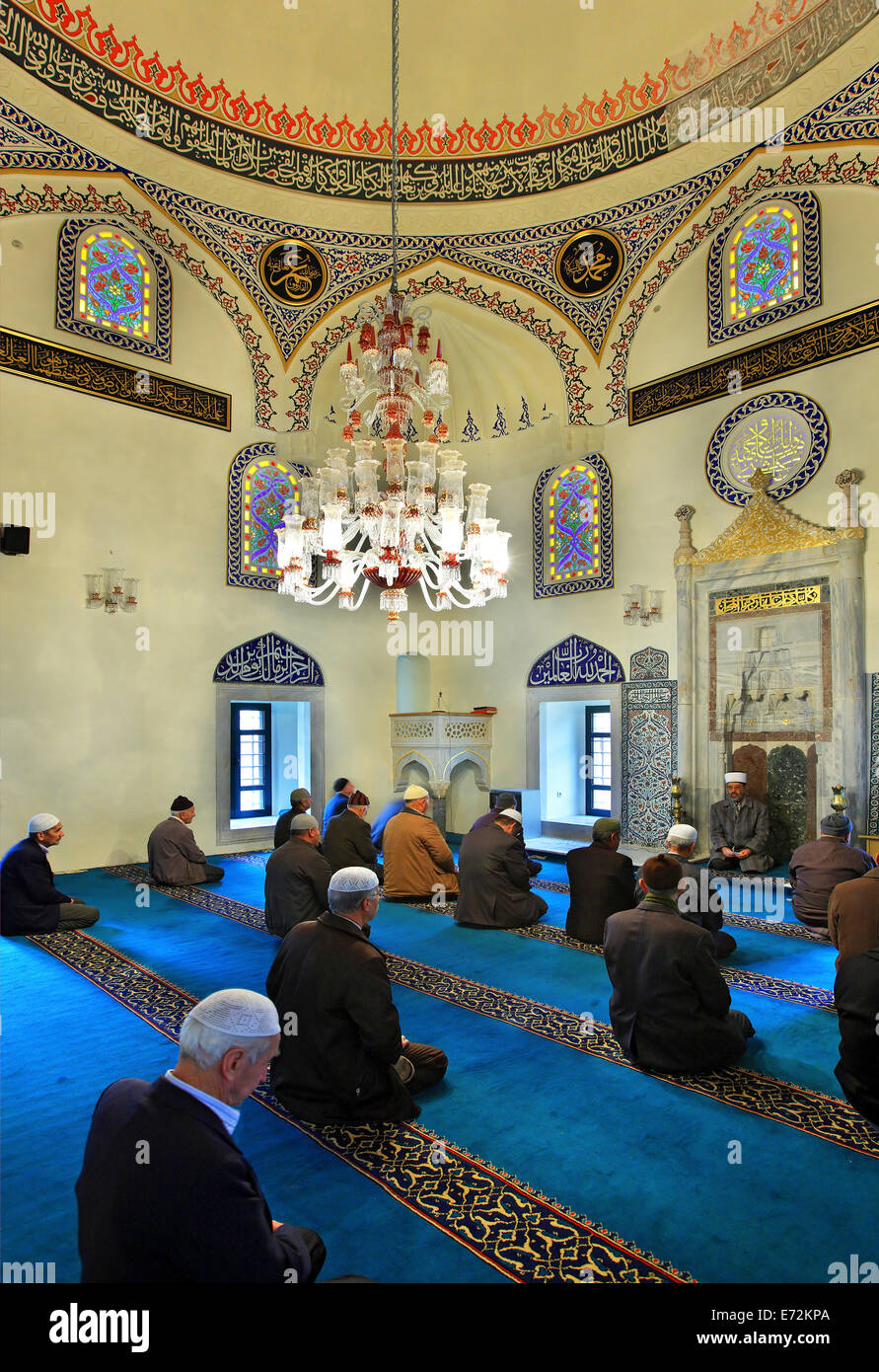 Greek Muslims praying inside Yeni Camii (it means 'New Mosque'), Komotini town, Rodopi prefecture, Thrace, Greece Stock Photo