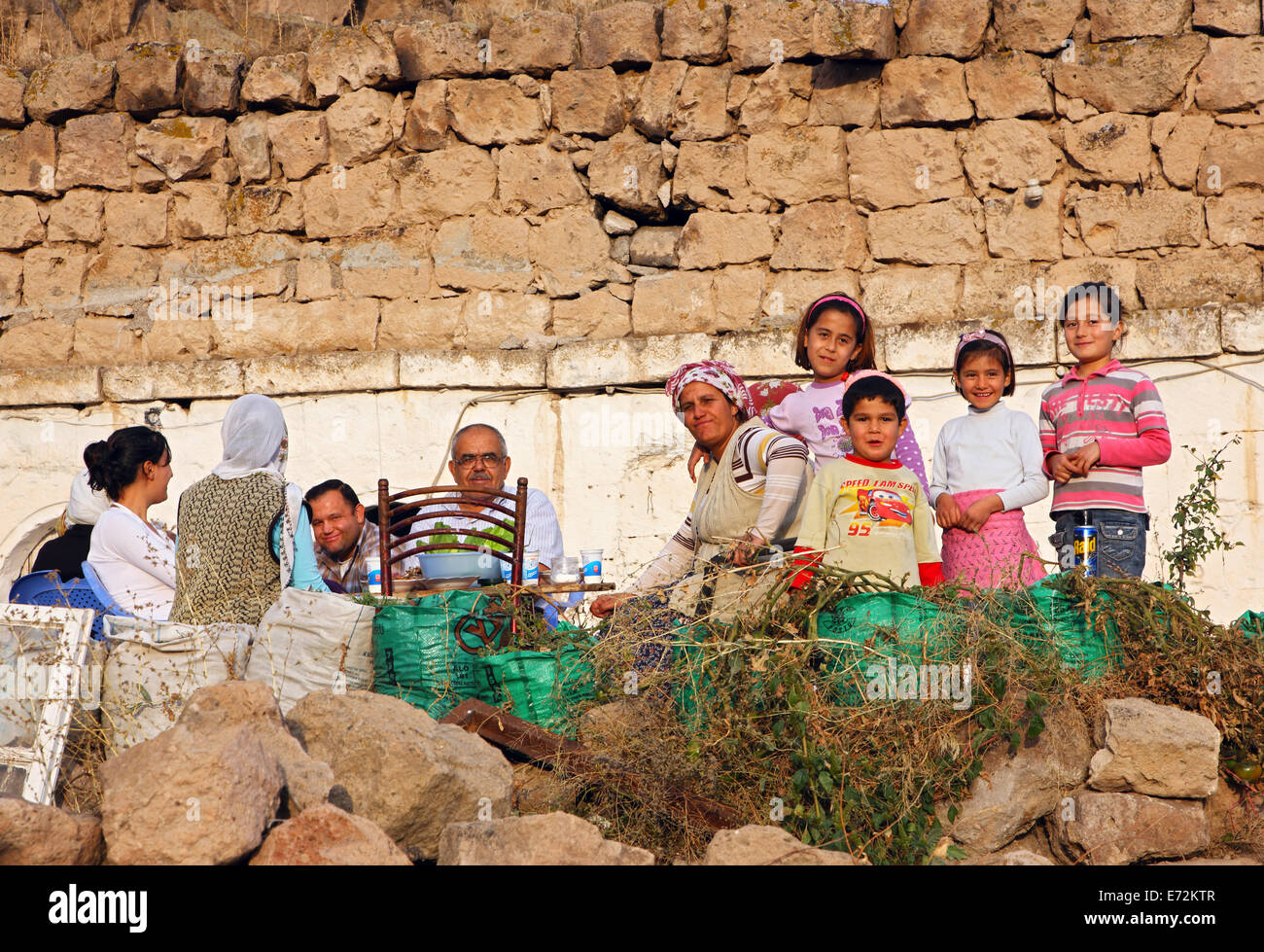 Traditional Turkish family in Mazi (Mazikoy) village, Nevsehir, Cappadocia, Turkey Stock Photo